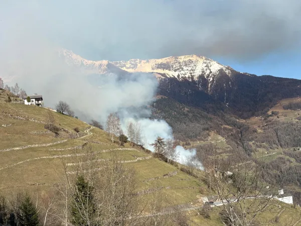 Rauchwolke oberhalb Brusio GR